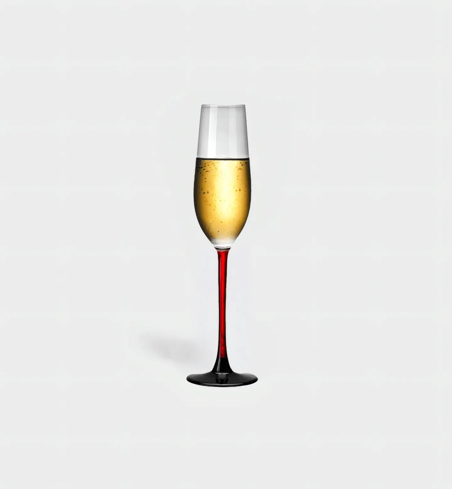 Verre à champagne 205 ml au design traditionnel avec pied rouge ou noir, alliant élégance classique et touche moderne pour des toasts stylés.