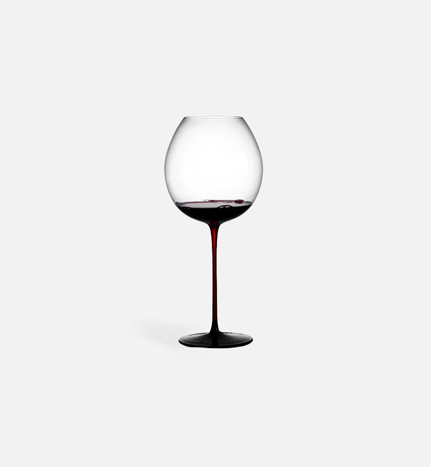 Verre à vin rouge 860 ml avec forme boule au sommet du pied, disponible en versions lisse ou ondulée. Pied rouge distinctif et design élégant pour sublimer vos dégustations.