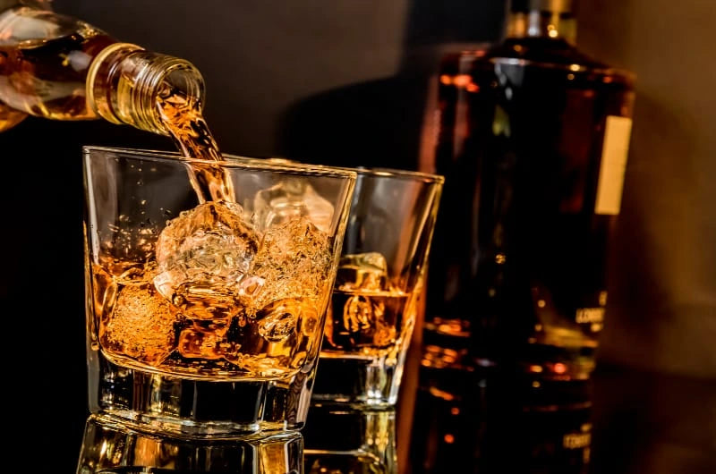 elegant bar ambiance whisky service refined tasting