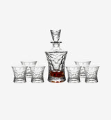 Service à whisky en cristal Érosion — carafe et verres, vue de face sur fond blanc