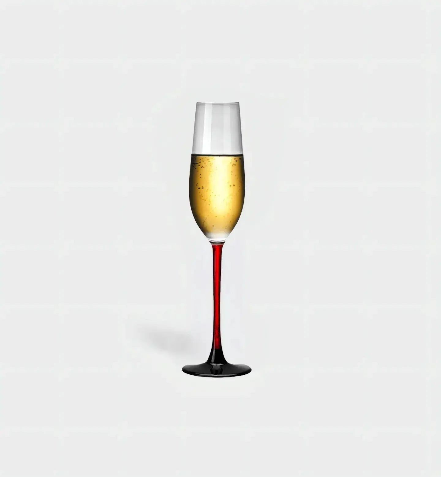 Verre à champagne 205 ml au design traditionnel avec pied rouge ou noir, alliant élégance classique et touche moderne pour des toasts stylés.