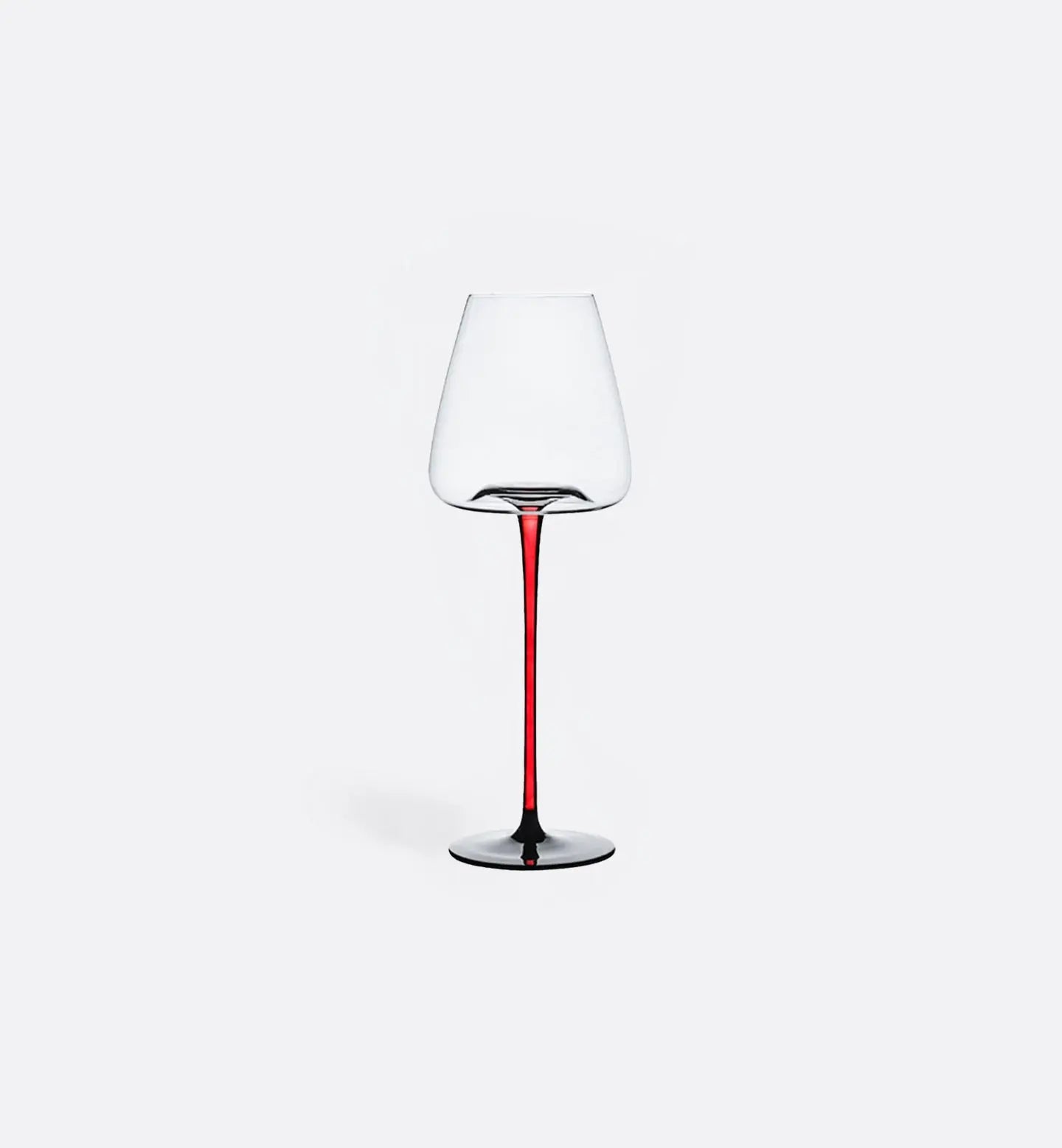 Verre à vin rouge en cristal 590 ml, classique et équilibré avec pied rouge. Parfait pour vins corsés et dégustations élégantes.